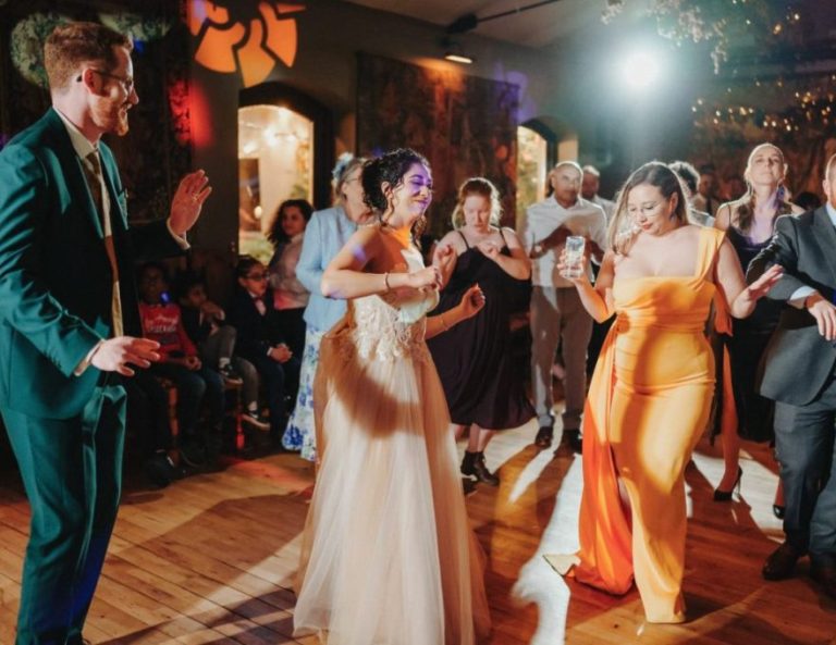 people dancing at a wedding